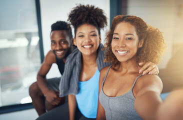 Poster - get excited about getting fit. cropped shot of three young people taking a selfie after yoga class.