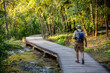 © Westend61 - Elderly tourist walking on footbridge, Krka National Park, Sibenik-Knin, Croatia