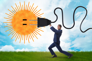 Wall Mural - Businessman in solar energy concept