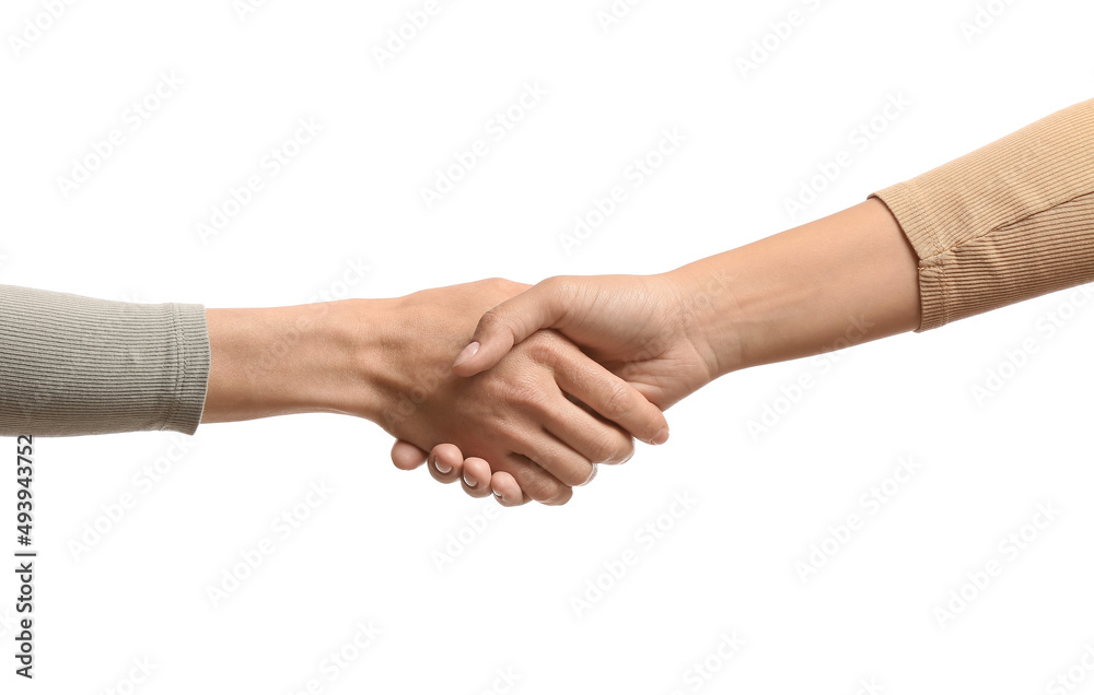 Women shaking hands isolated on white