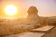 Restoration work for old Sphinx Cairo Egypt sunset sky
