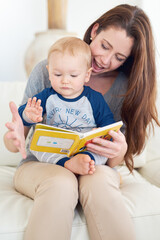 Poster - Turn the page Mom and tell me what happens next. Cropped shot of a mother reading a book to her baby boy at home.