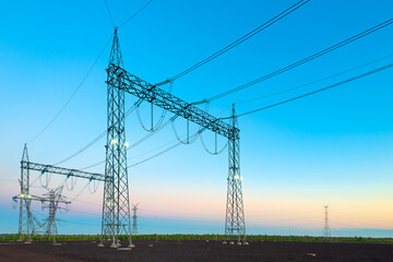 Wall Mural - Electric substation and pwer lines in Paraguay at dawn.