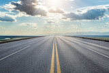 Straight asphalt road and beautiful sky clouds at sunrise