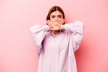 Young caucasian woman isolated on pink background doing a denial gesture