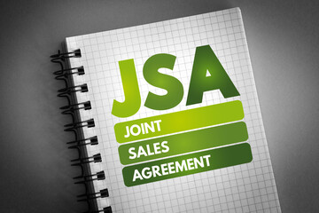 Aufkleber - jsa - joint sales agreement acronym on notepad, business concept background