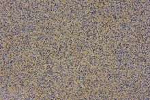 Interior Rubber Flooring Material In Yellow Shade Using In Fitness ,gymnasium Or Playground For Prevent Accident. Close Up Of Soft Floor Texture Background.