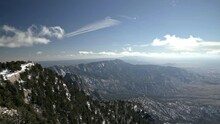 Wide View Panning From Summit Of Sandia Mountains To Albuquerque, New Mexico