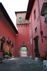 Wall Mural - Entrance door to the Ariostesca fortress in Castelnuovo Garfagnana, Tuscany, Italy