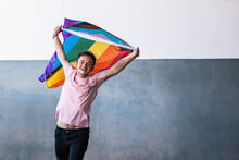 Excited Transgender Person With LGBT Flag