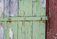 Closeup Of A Green Old Wooden Door