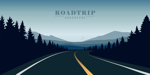 Wall Mural - straight road in the forest on blue mountain landscape