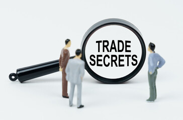 Poster - On a white background, figures of businessmen and a magnifying glass with the inscription - TRADE SECRETS