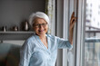 © pikselstock - Portrait of smiling senior woman at home
