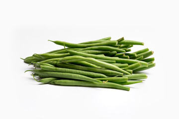 A heap of fine green beans or french beans on a white background. 