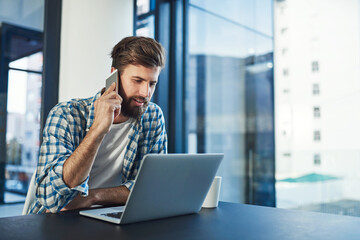 Poster - On call and busy sealing a successful deal. Cropped shot of a young designer talking on a cellphone in a modern office.