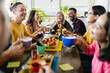 © Xavier Lorenzo - Happy group of multiracial people gathering together while having breakfast on rooftop cafe restaurant. People laughing and feeling happy - Focus on blonde woman in the center