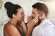 © Nikish Hiraman/peopleimages.com - Im glad I get to wake up next to you. Cropped shot of a young attractive couple lying in bed together at home.