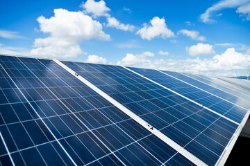 solar panels against blue sky background