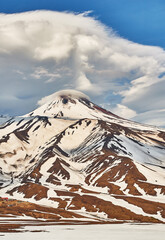 Wall Mural - Volcano peak at sunset. Kamchatka, Russia. Travel and tourism