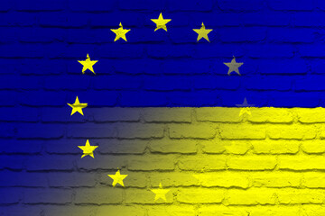 Wall Mural - European Union (EU) and Ukraine. European Union flag and Ukraine flag. Concept of aid, association of countries, political and economic relations. Flag with brick wall texture. OTAN-NATO flag.