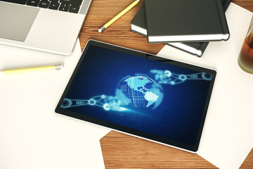 Aufkleber - Top view of modern digital tablet monitor with robotics technology and world map hologram. Research and development software concept. 3D Rendering