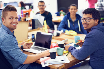 Poster - The IT experts. Shot of employees in an IT office.