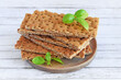 Crackers with a high fiber content, buckwheat crackers in a clay plate.Crispy buckwheat bread.Healthy eating.