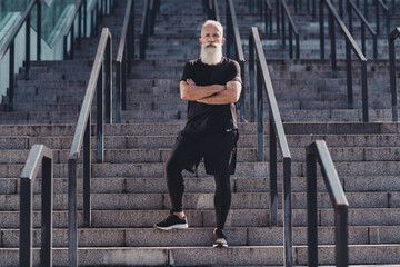 Sticker - Full length photo of aged white hair strong man folded arms wear black t-shirt shorts sneakers outside in city