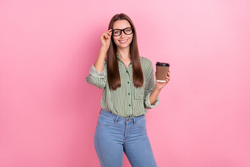 Wall Mural - Photo of cool young brunette lady takeout coffee wear eyewear striped shirt isolated on pink color background