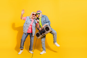 Poster - Photo of charming sweet girlfriend boyfriend dressed denim outfit listening boom box singing isolated yellow color background