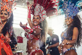 Come and have a festive time with us. Shot of samba dancers performing in a carnival.