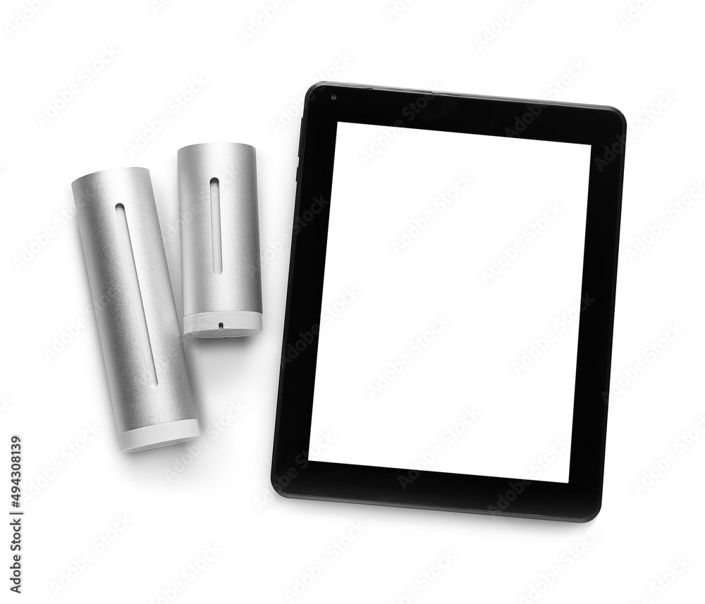 Digital weather station and tablet computer on white background