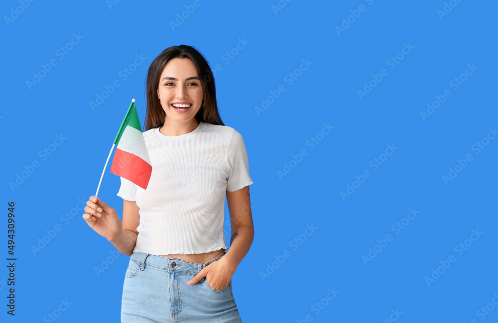 Young woman with Italian flag on color background