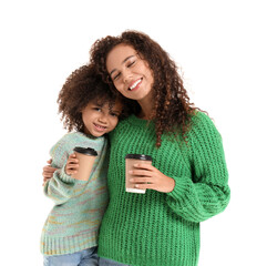 Poster - African-American mother and her little daughter in sweaters with cups of hot cocoa on white background