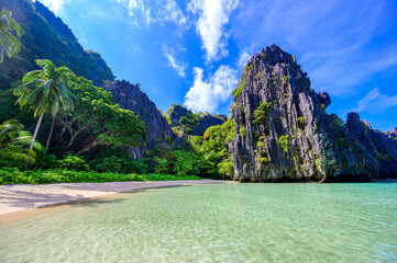 hidden beach in matinloc island, el nido, palawan, philippines - paradise lagoon and beach in tropic