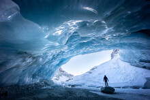 Ice Cave Exploration In Zinal Glacier, Valais Switzerland