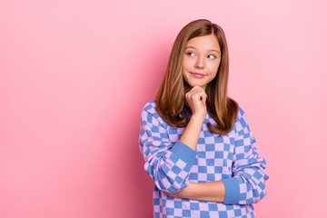 Sticker - Photo of young lovely girl hand touch chin look empty space think minded isolated over pink color background