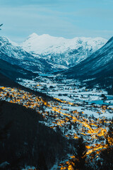 Wall Mural - Beautiful aerial shot of a mountain landscape town at winter