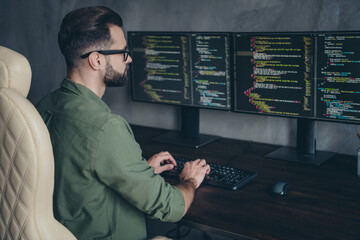 Poster - Profile side view portrait of attractive intellectual skilled guy writing css cms html building process algorithms at work place station indoors