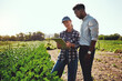 © Chanelle Malambo/peopleimages.com - Just take a look at these growth figures. Cropped shot of two young farmers looking at a tablet while working on their farm.