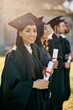 © Katleho Seisa/peopleimages.com - This is such a huge honor and accomplishment. Shot of a group of students standing in a line on graduation day.