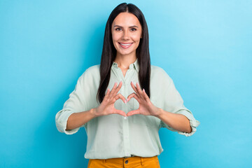 Poster - Photo of young pretty woman show fingers heart shape cupid romantic isolated over blue color background