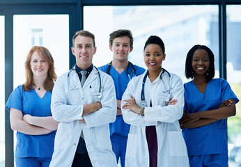 We strive to be the best doctors we can be. Portrait of a team of confident young doctors working in a hospital.