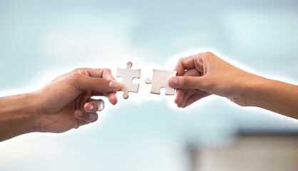 Poster - I bring the idea, she executes it. Cropped shot of two unrecognizable businesspeople holding up two puzzle pieces in the office.