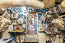 Interior Of Old Abandoned Russian Soviet Submarine. Interior Of Combat Submarine Compartment With Devices Of Control