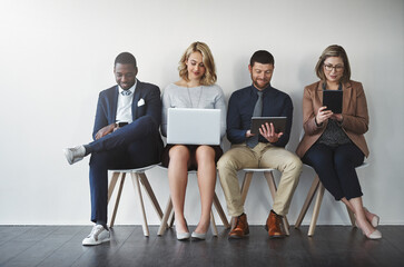 Poster - They were all shortlisted, they are experienced in the job. Studio shot of businesspeople waiting in line against a white background.