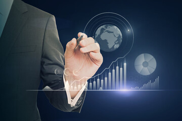 Poster - Close up of businessperson hand pointing at abstract glowing business chart on blurry blue background. Trade, finance and economy concept. Double exposure.