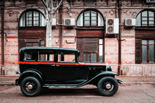 Old Taxi Waiting At A Train Station. Vintage Car. Oldtimer