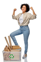 Wall Mural - recycling, waste sorting and sustainability concept - happy smiling woman holding paper garbage in plastic box showing her power over white background